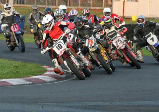 The feature race of the day for the David Jefferies Trophy. Conor Cummins leads Paul Gartland. Picture: Roy Adams.