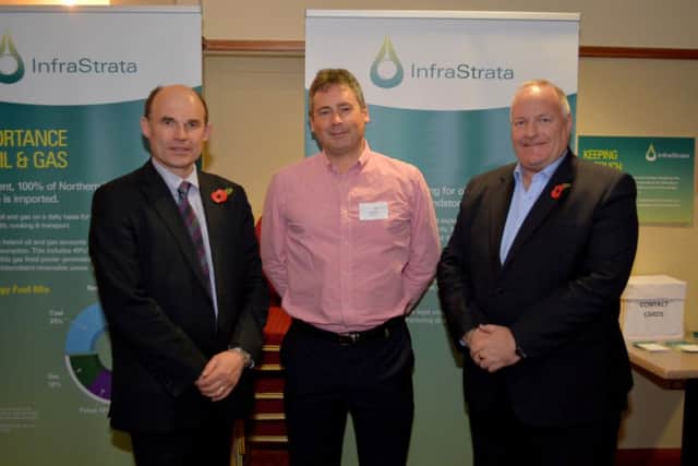 East Antrim MLAs Roy Beggs (left) and David Hilditch (right) with Andrew Hindle, CEO InfraStrata, at a public information session on the project. INCT 46-101-GR