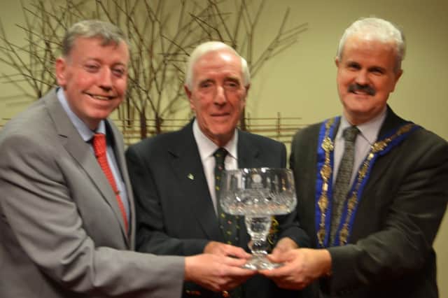 Presentation to Ivor McCandless to commemorate his year as GUI President from Alderman Paul Porter and Deputy Mayor Cllr Thomas Beckett.