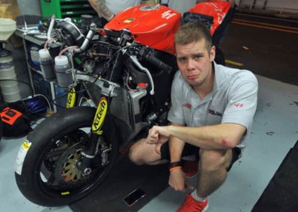 A disconsolate Jamie Hamilton after being ruled out of the Macau Grand Prix when his Craig Honda was badly damaged in a crash during the opening qualifying session.
Picture: Stephen Davison