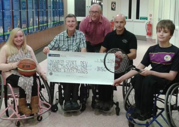 A cheque was recently presented to Disabled Sport Development following the annual Freewheelers charity cycle in August.