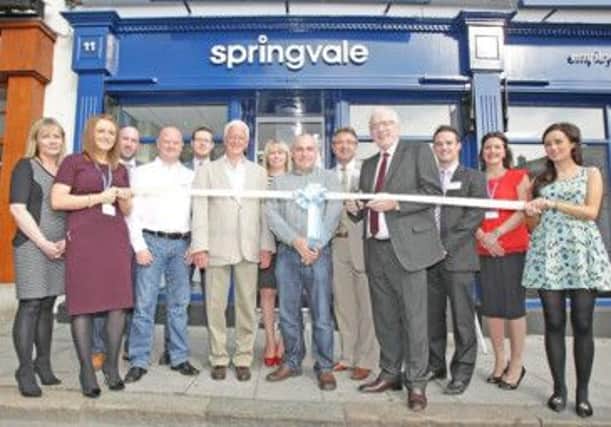 The Chairman of Lisburn City Council's Economic Development Committee, Alderman Allan Ewart, attended the official opening of Springvale Training which is based in Lisburn City Centre and is pictured with staff from Springvale at its new premises.