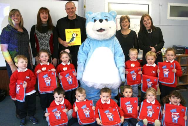 Children of Barbour Nursery greet author who visited them