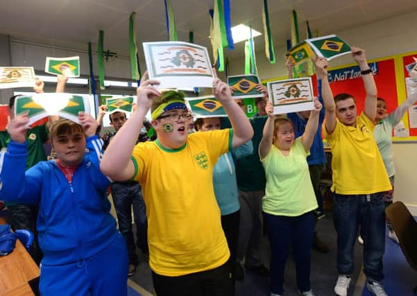 Visiting Brazilian teachers were entertained by a football chant when they visited Hillcroft School in Newtownabbey recently. INNT 48-455-CON