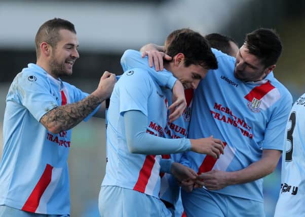 Ballymena United's Mark Surgenor is congratulated by his team mates after scoring the second of his two first half goals in today's game against Ballinamallard at the Showgrounds. Picture: Press Eye.