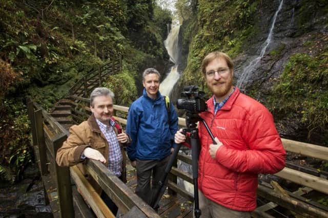 Conor Marshall, Tourism Ireland (left) with online film maker, Mark Flagler, and Jason Powell, Causeway Coast and Glens on location in Glenariff Forest Park, near Cushendall, which features in Tourism Irelands new online film about the Ulster-Ireland section of the International Appalachian Trail. 

Pic by Brian Morrison.