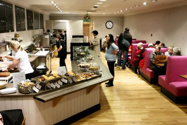 Bright and friendly surroundings at Caffee Tosca. INBT48-234AC