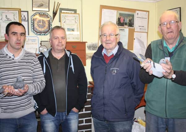 Pictured at last week's Ballymena & District HPS show are (from left): W Gilbert, J Steele, D Dixon and BIS Len Russell.
