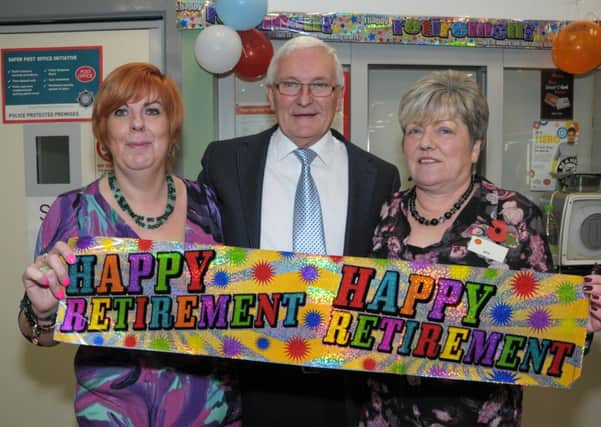 Rathcoole Post Office sub-postmaster, David Prince pictured at the surprise party to mark his retirement with his colleagues, April Oliver and new office manager, Jane Mackey. INNT 47-204-AM