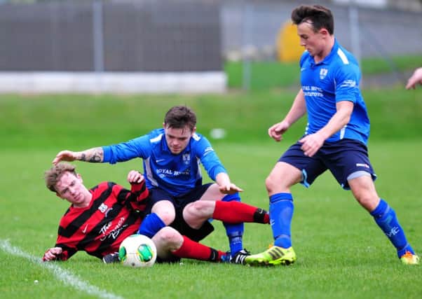 Killymoon's Declan Campbell battles for the ball during a recent match