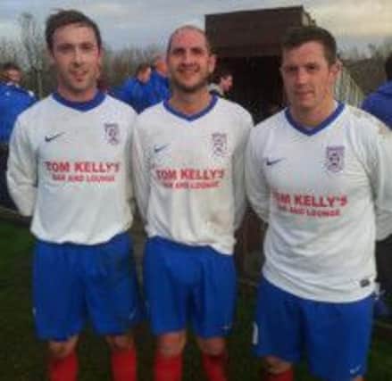 Moneyslane goal-scorers Gregg Harrison, Bran Quilty and Mark Ervine looking pleased at full-time.