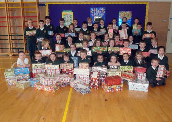 Pupils from St. MacNissis P.S. with their shoeboxes which they will donate to Blythswood Care christmas Shoebox Appeal INLT 47-200-AM