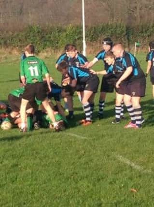 Ballymoney U14 target the ball at the back of a City of Derry ruck.