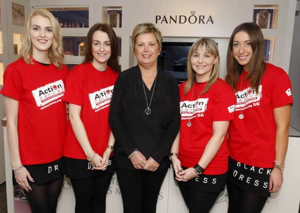 Kathryn McIntyre, Megan Watton, Jennifer Bond, Amy Davison, and Courtney Dinsmore of Bond's Jewellers in Coleraine who are fundraising for Action Cancer. INCR47-335PL