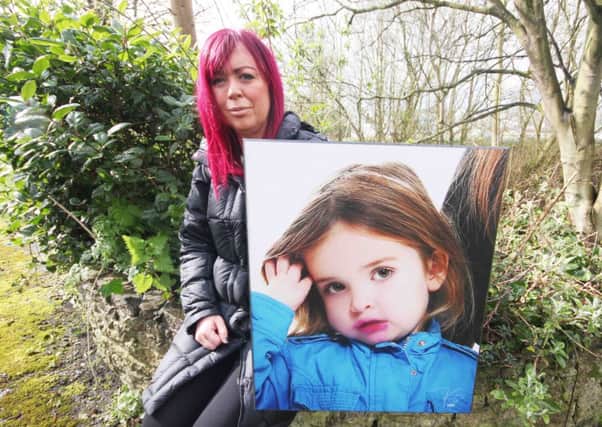 Andrea McAleese, with a picture of her beloved daughter Roma who died five years ago, at the site where an Angel of Hope  Memorial Garden will be situated beside the Coleraine Borough Council offices on the Portstewart Road. PICTURE MARK JAMIESON.