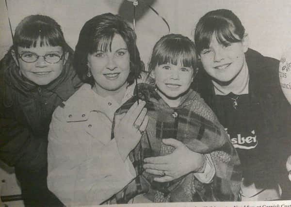 Christina, Carla, Nicky and mum Fiona Smith were among the people to enjoy the Children in Need fun at Carrickfergus Castle in November 1997. INCT 48-708-CON HIST