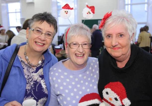 Deaconess Evelyn Whyte, Maureen Staniland and Florence Blair at the Christmas Fair at First Lisburn Presbyterian Church. US1448-603cd  Picture: Cliff Donaldson