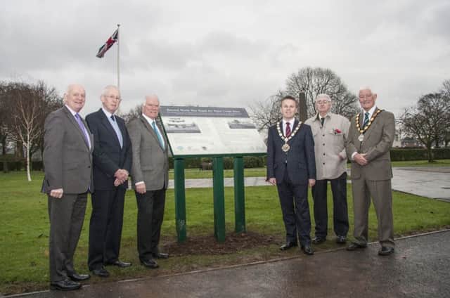 Dr William McCrea MP; Ernie Cromie and Ray Burrows from the Ulster Aviation Society; Mayor Thomas Hogg; local historian William Cobain and Deputy Mayor Pat McCudden at the unveiling of the interpretative panel at Ballyclare War Memorial Park. INNT 49-514CON