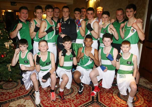 Members of All Saints Boxing Club pictured during their recent fight night with an Ulster Select. INBT49-236AC