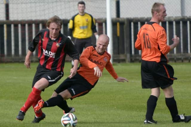 Banbridge Town have ended their three game losing streak with a well-earned draw at Queens. INBL1437-248eb