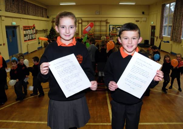 Linn PS pupils, Eva and Mark with their letters which they are sending to the First Minister and Deputy First Minister regarding the united Nations Charter, The Rights of a Child INLT 48-203-AM