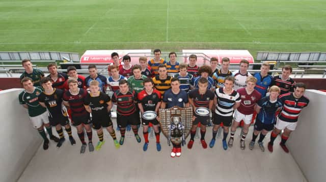 Captains pictured with the Schools' Cup before the first round draw. (s)