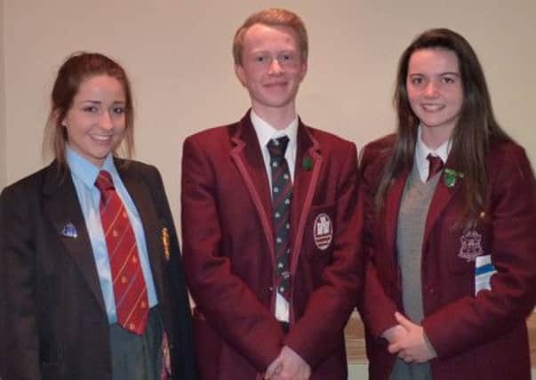 Erin Tweedie, Downshire, Philip McCullough, Carrickfergus College and Anna Maguire, Ulidia Integrated College, who competed in the local finals of the Youth Leadership competition. INCT 49-719-CON ERIN