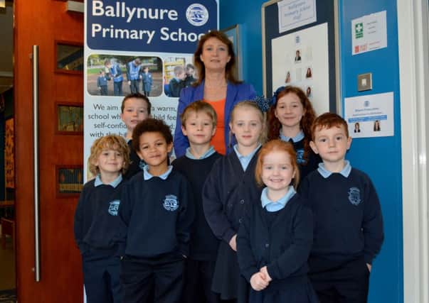 Ballynure Primary School principal Elaine Doherty with some of the school's pupils. INNT 49-128-GR