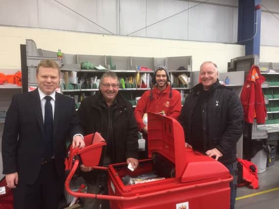 East Antrim MLAs Alastair Ross, Sammy Wilson and David Hilditch made an early morning visit to Carrickfergus Royal Mail sorting office to show support for the staff at this busy time of year. INCT 49-783-CON