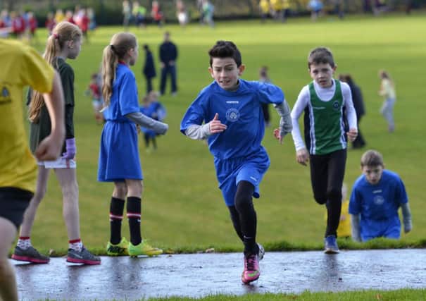 Action from the Primary Schools Cross Country race at Oakgrove 
Integrated College last month. INLS4614-117KM