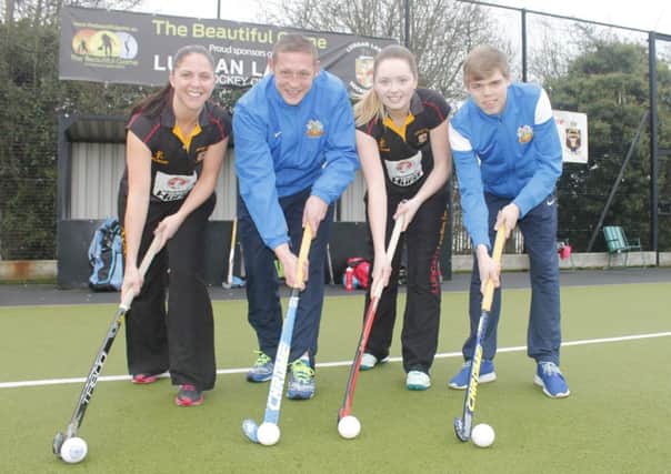 Glenavon players Kris Lindsay and Rhys Marshall get some hockey tips from Lurgan Ladies captain Charlene Hull and Sarah McClure before their Irish Hockey League clash with Ballymoney on Saturday. Glenavon were sponsors of the game.