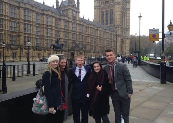 Outside the House of Lords are Ballyclare High pupils (from left) Lauren Hill; Anna Montgomery; Stuart Wilson; India Barr and Jonny Gilpin who were in London for a debate in the House of Lords. INNT 50-450-CON