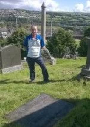 "In response to the article 'Graves commission deeply saddened by vandalism,' I must emphasise it was vandalism. 
My brother drives the Action Cancer van that was parked at the cemetery gates and it was doused in paint around the same time. 
Here's me from the Creggan during the summer cleaning the grave of Dean Cecil Frances Alexander's son, killed WW1 in the sinking of the SS Leinster." Seamus Breslin.