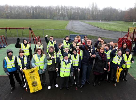 Pictured at Queen Elizabeth II Playing Fields with Councillor Jenny Palmer, Chair of the Council's Environmental Services Committee are pupils of Parkview School who undertook a litterpick of the area and the Mayor of Lisburn, Councillor Andrew Ewing.