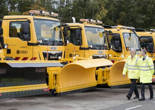 Transport Minister Danny Kennedy was in Ballymena this week to inspect some of the 40 strong new gritter fleet that will be in service across Northern Ireland fighting ice and snow during this years Winter period. Pictured with Transport NIs Gareth McMullan and Damian McQuillan at Ballykeel Depot.