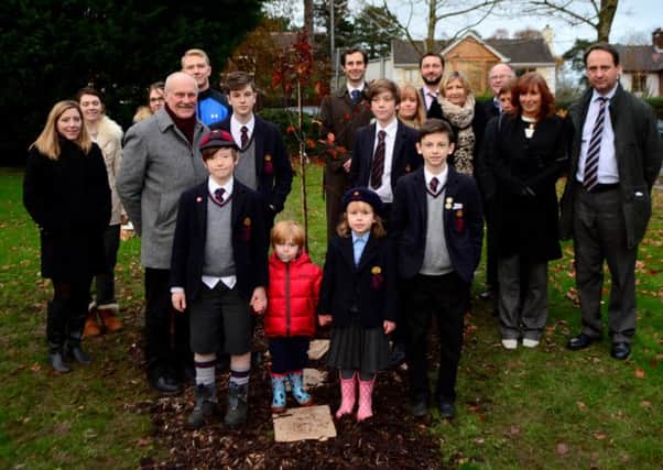 Family and friends of former Principal of Thornfield School Ann Ingram at a tree planting ceremony in the grounds in the school grounds. INNT 49-101-GR
