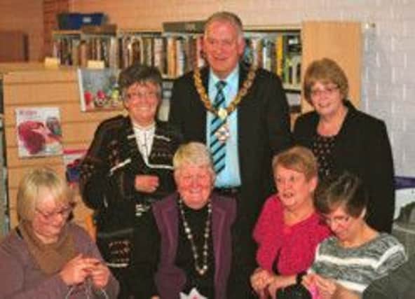 PICTURED:  Councillor Evelyne Robinson and Libraries NI Board Member, The Mayor Alderman Bill Kennedy of Ballymoney Borough Council, Irene Knox Chief Executive, Libraries with ladies from Ballymoney, Knit and Natter Group. inbm50-14s