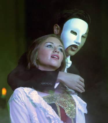 ON STAGE. David Tnag (Phantom) and Rachel McClelland (Christine Daae), two of the main characters in a scene from Dalriada's performance of 'Phantom of the Opera'.INBM50-14 007SC.