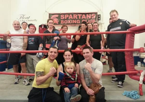 Pictured with members of Ballyclare-based Spartans ABC, Ashleigh Brown with her son, Saul, head coach William Thompson (front left) and trainer Paul Kelly. INLT 50-902-CON