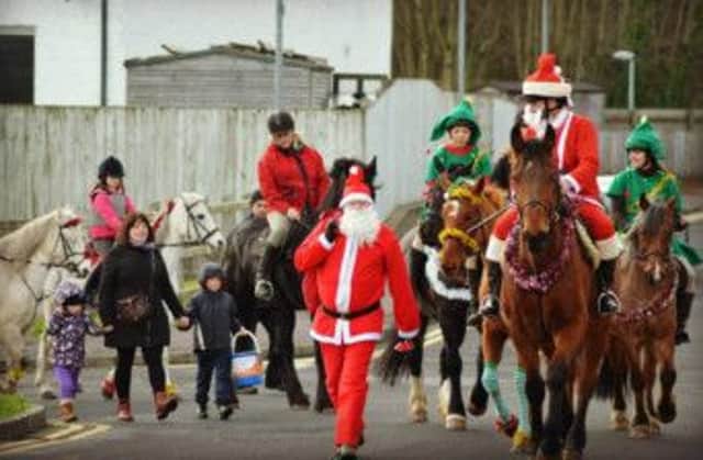 Pictured at last year's Santa Pony Parade in Ballycastle. inbm50-14s