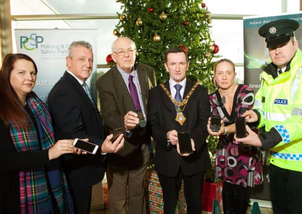 Pictured with the Mayor of Coleraine, Councillor George Duddy, are Pearl Mahon, Coleraine Borough Councils Health and Well-Being Officer, Gary Mullan, Councils Policing and Community Safety Partnership Manager, Councillor David Barbour, Chair of Coleraine Policing and Community Safety Partnership, Melissa Lemon, Coleraine Borough Councils Policing and Community Safety Partnership Officer and Constable Syd Henry, Roads Policing Education Officer, Police Service of Northern Ireland.