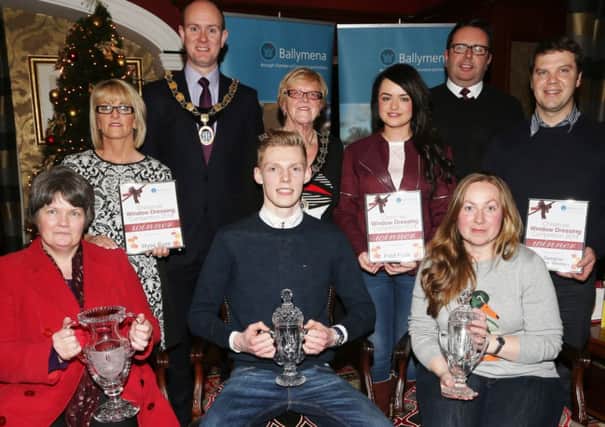 Chamber President Alan Stewart and Mayor Audrey Wales MBE congratulate the winners of Ballymena Chamber of Commerce Christmas Window Display Competition.
    - Wyse Byse, Church St.
   - Fred Funk, Ballymoney Street.
   - Designer Home Interiors, Broughshane.