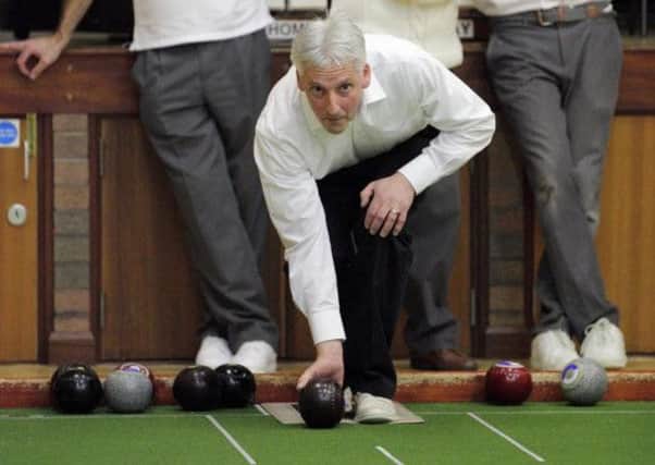 Michael Fall bowling for Lisburn during the Men's Inter Zone match at Eglantine Parish Hall. US1449-538cd  Picture: Cliff Donaldson