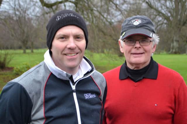 Colin Todd and John McMillan are wrapped up warm for the winter golf at Lisburn GC.