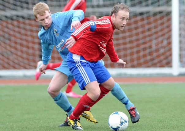 Former Islandmagee player Tyson Gray, seen here in action against Immaculata. Photo: Presseye