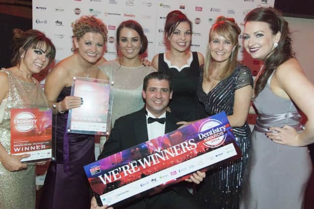 Some of the Dunmurry Dental Practice team picking up their awards in Leicester.