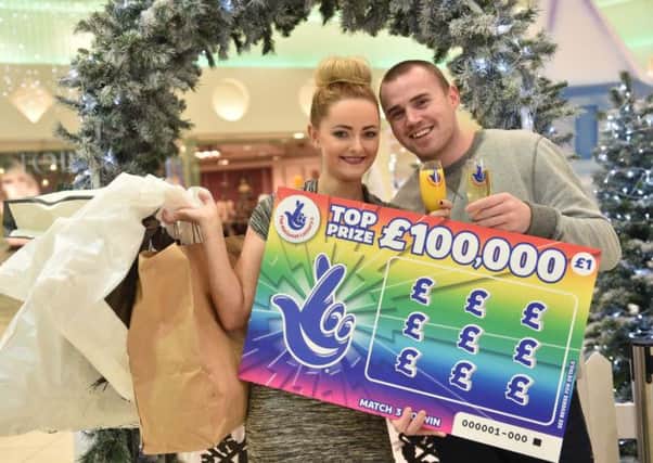 Lauren McLarnon (23) from Newtownabbey went on a celebratory shopping spree in Abbeycentre with her partner, Michael Mullen (25) after she won a staggering £100k on a National Lottery Scratchcard. INNT 51-501CON