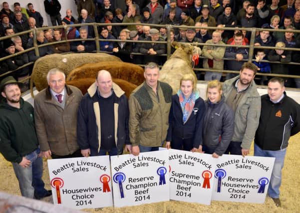 FROM LEFT TO RIGHT-JUDGE BARRY HUTTON, SAM CARMICHAEL,
MICHAEL HEALY WINNER OF HOUSEWIFES CHOICE & 2ND IN BEEF HEIFER CLASS, LOUGHLIN CONN & daughters IST IN BEEF HEIFER CLASS, PAUL FAULKNER IST IN BEEF BULLOCK & RESERVE HOUSEWIFES CHOICE, SPONSOR OF AGRI CARE  GERARD SNOW