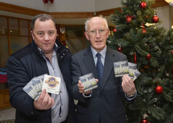 Davy Jackson, Chairman, and Albert Smallwoods, Press Officer, Foyle & District Road Safety Committee, pictured with their Never Drink & Drive campaign beer mats. INLS5014-115KM