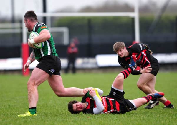Stephen Ferguson charges through the Rainey defence during City of Derrys Ulster League clash, on Saturday. INMM5114-421